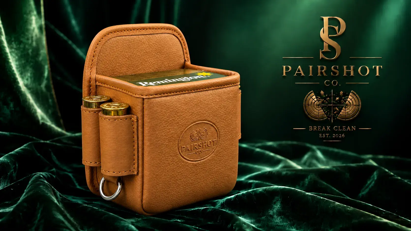 Saddle-tan leather shell pouch on green velvet